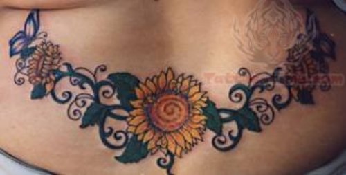 Sun Flower And Lowerback Tattoo